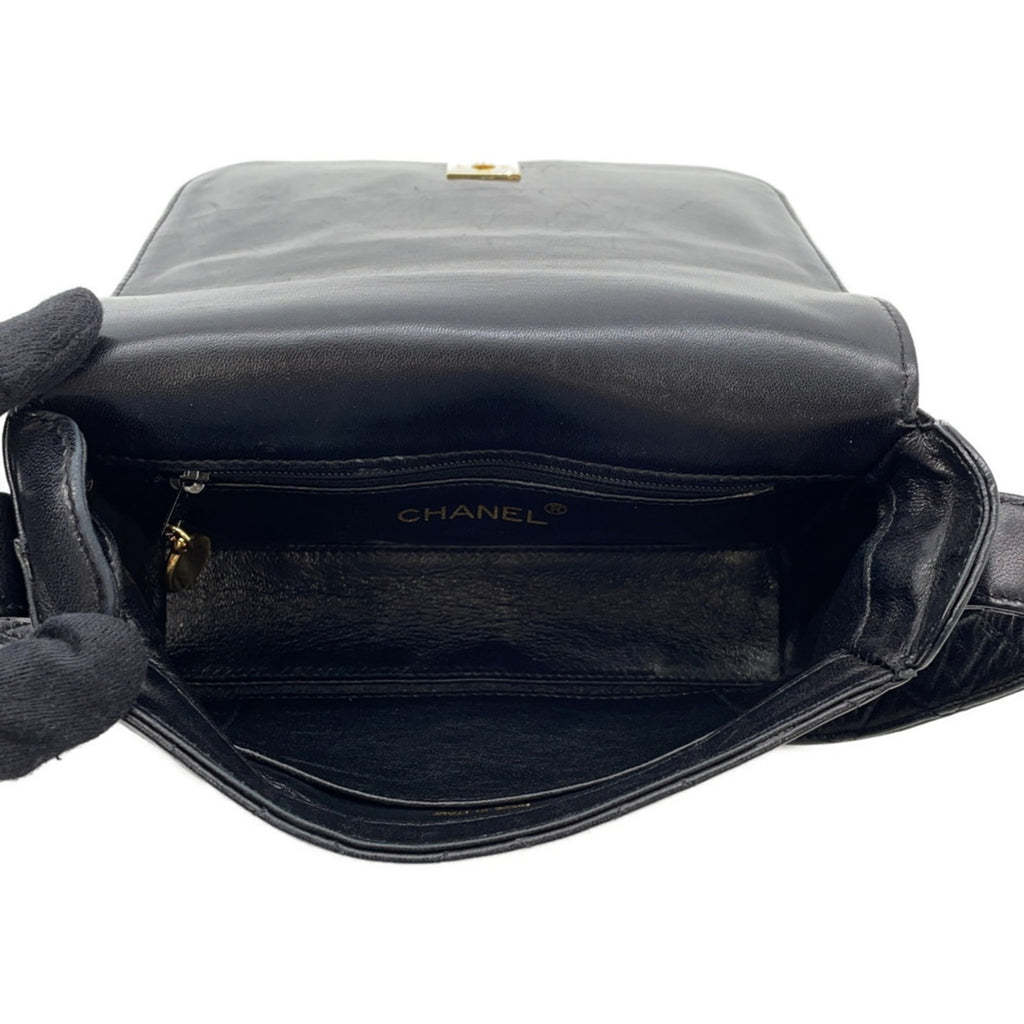 Interior view of CHANEL Pre-Loved Matelasse Full Flap handbag showcasing its spacious design and signature logo