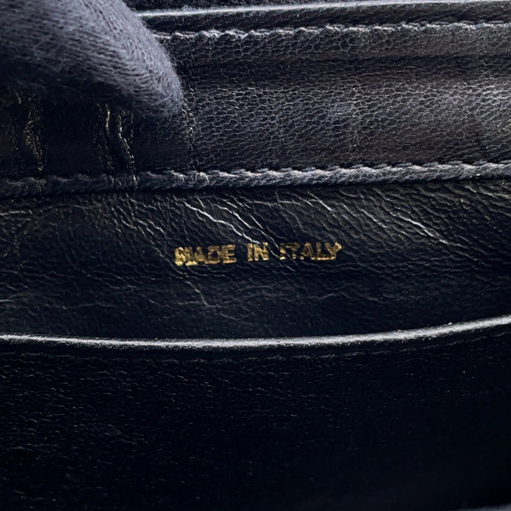 CHANEL Pre-Loved Matelasse Full Flap handbag interior showcasing made in Italy label on black leather