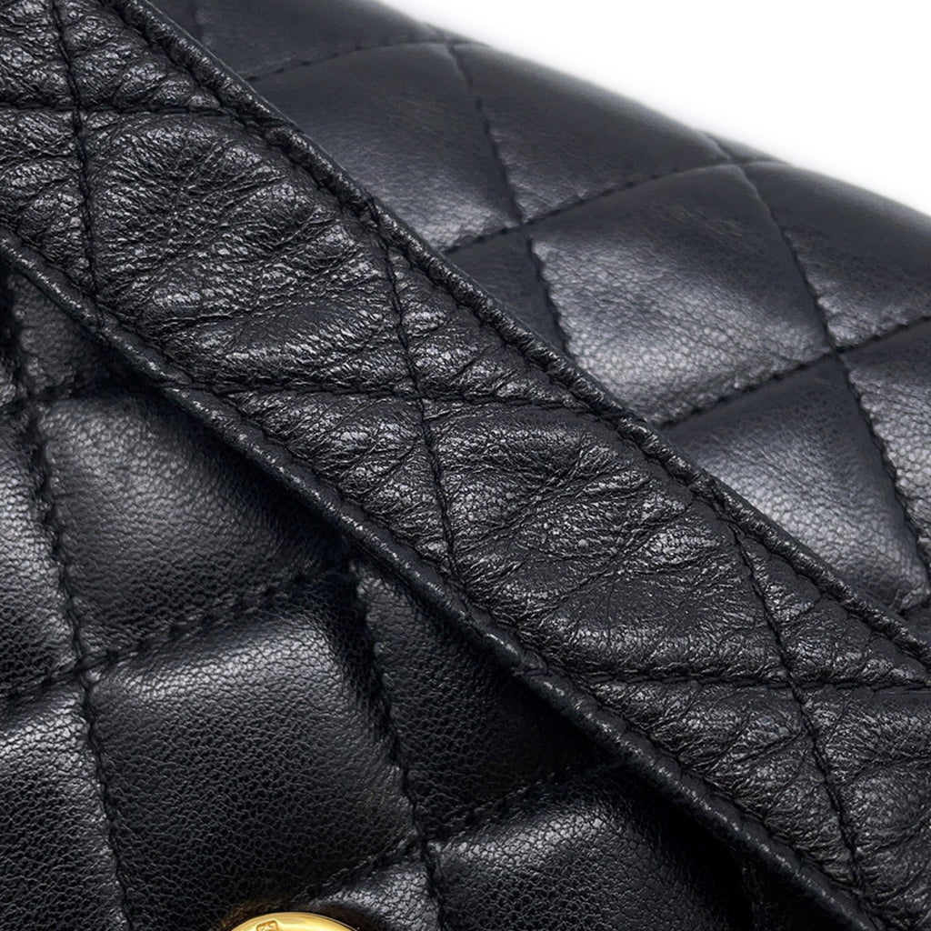Close-up of MANSII CHANEL Pre-Loved Matelasse Full Flap handbag featuring quilted leather design