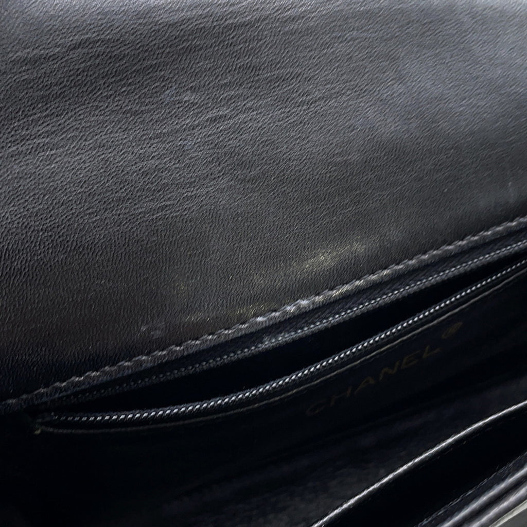 Interior of MANSII CHANEL Pre-Loved Matelasse Full Flap bag showing zipper pocket and leather lining