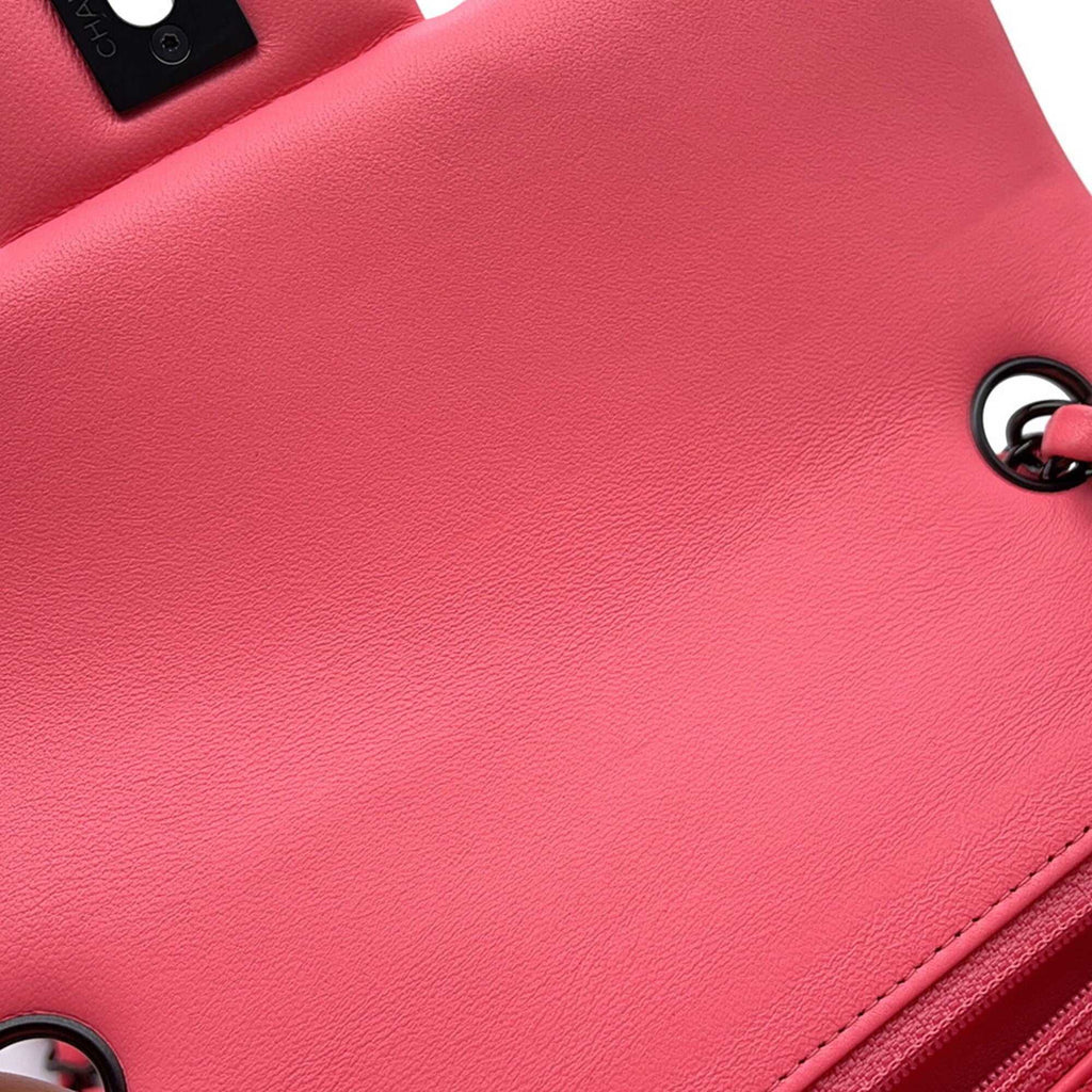 Inside view of CHANEL Pre-Loved Mini Matelasse 20 pink handbag showcasing smooth leather and classic design