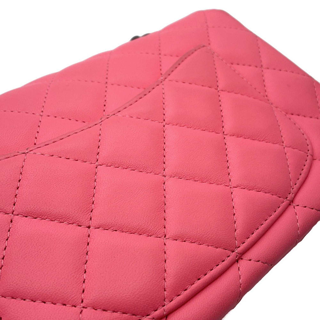 MANSII CHANEL Pre-Loved Mini Matelasse 20 pink bag featuring a quilted design and soft leather finish