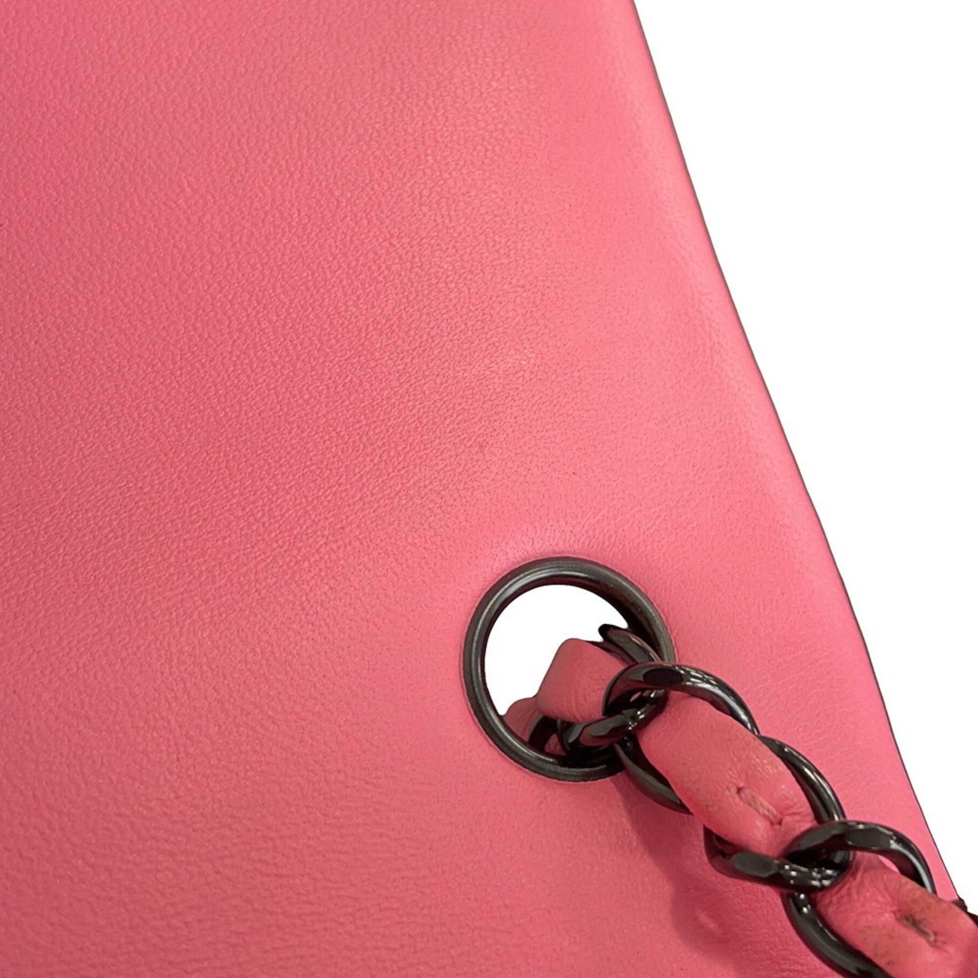 Close-up of MANSII CHANEL Pre-Loved Mini Matelasse 20 pink handbag showing the leather texture and chain detail