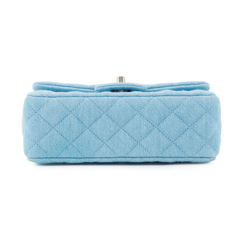 Bottom view of MANSII CHANEL Pre-Loved Mini Matelasse Denim Bag in Blue with Quilted Design