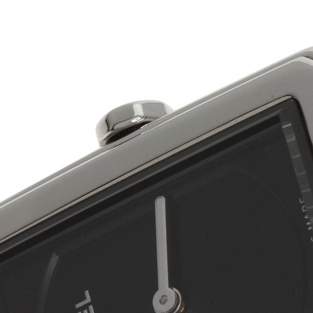 Close-up of pre-owned Chanel Boy-Friend watch with a sleek black dial and elegant design