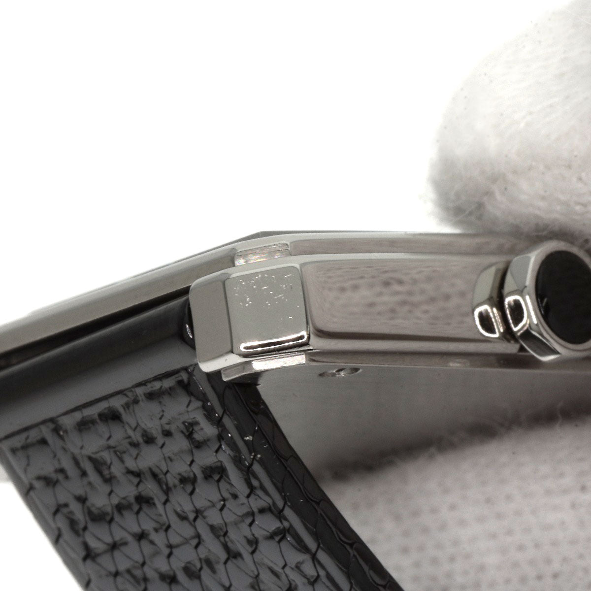 Close-up of pre-owned Chanel Boy-Friend watch showcasing its sleek design and black strap.