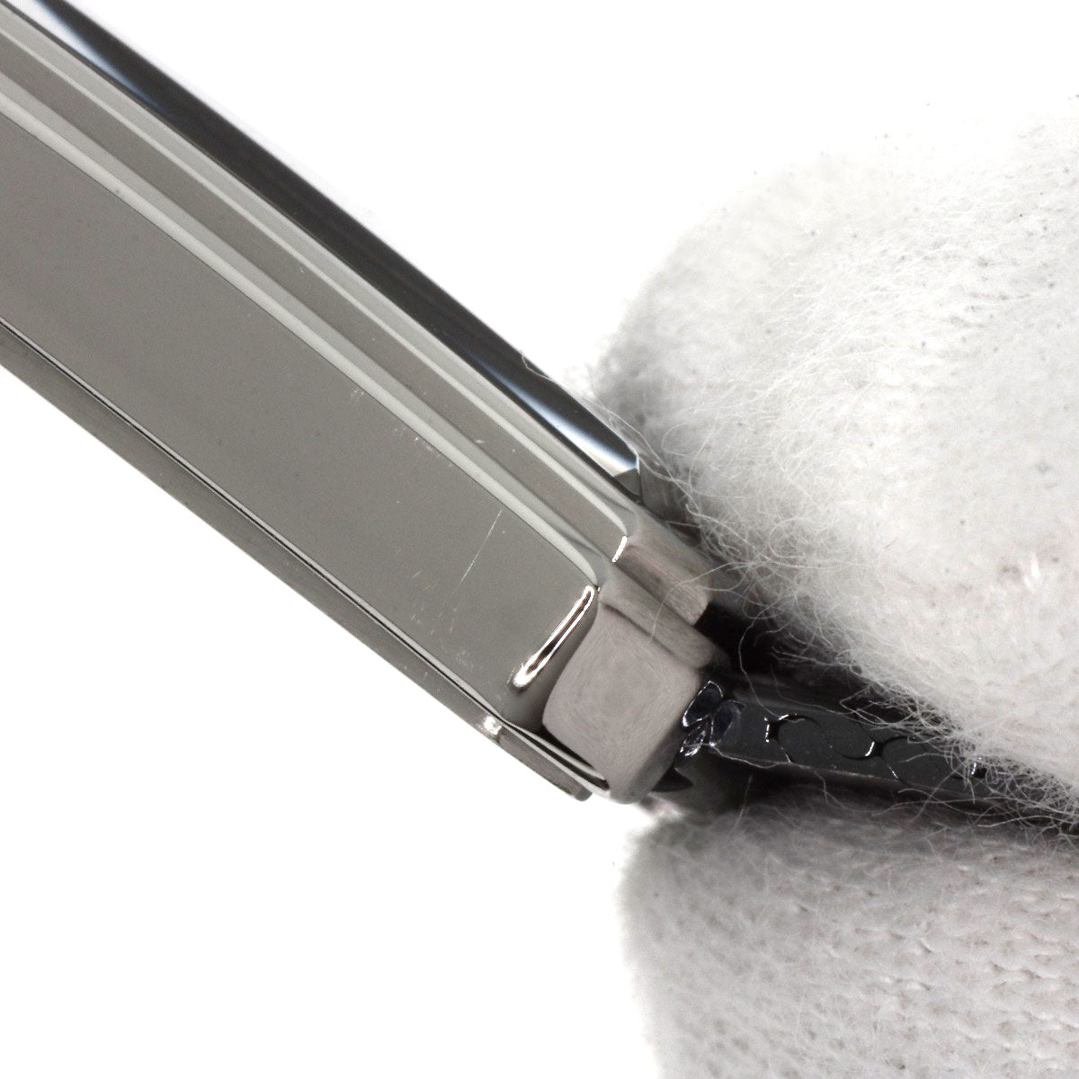 Close-up of pre-owned Chanel Boy-Friend watch showcasing sleek design and metal detailing