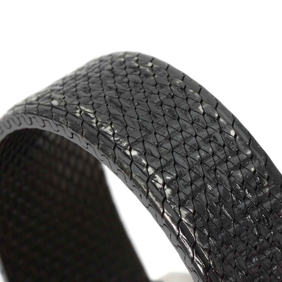 Close-up of pre-owned Chanel Boy-Friend watch with a textured black strap for stylish elegance