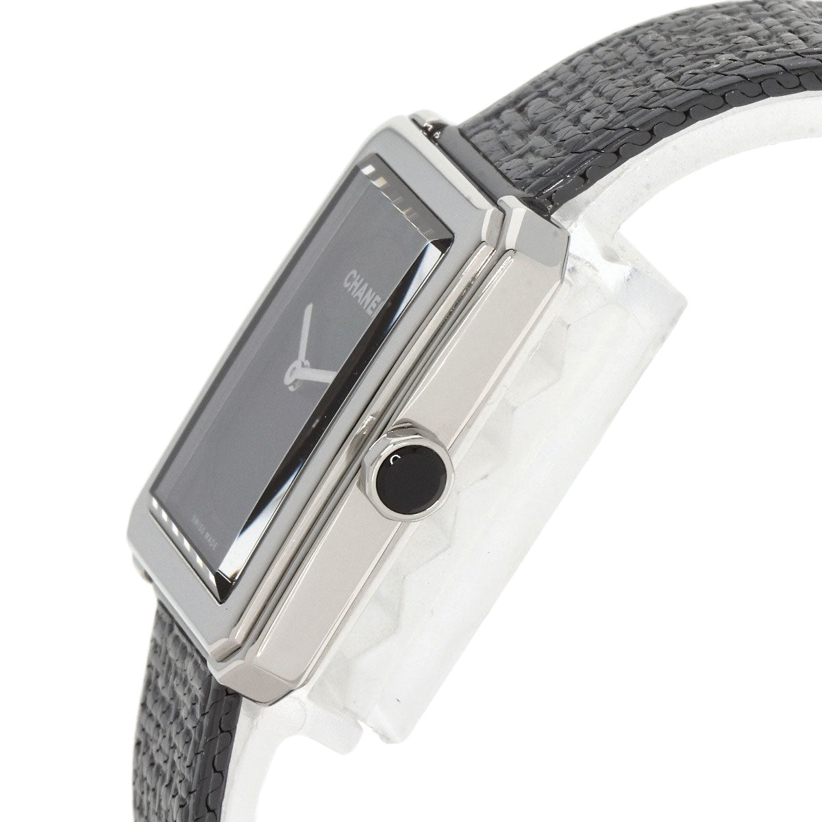 Elegant pre-owned Chanel Boy-Friend watch with a black strap and sleek rectangular face.