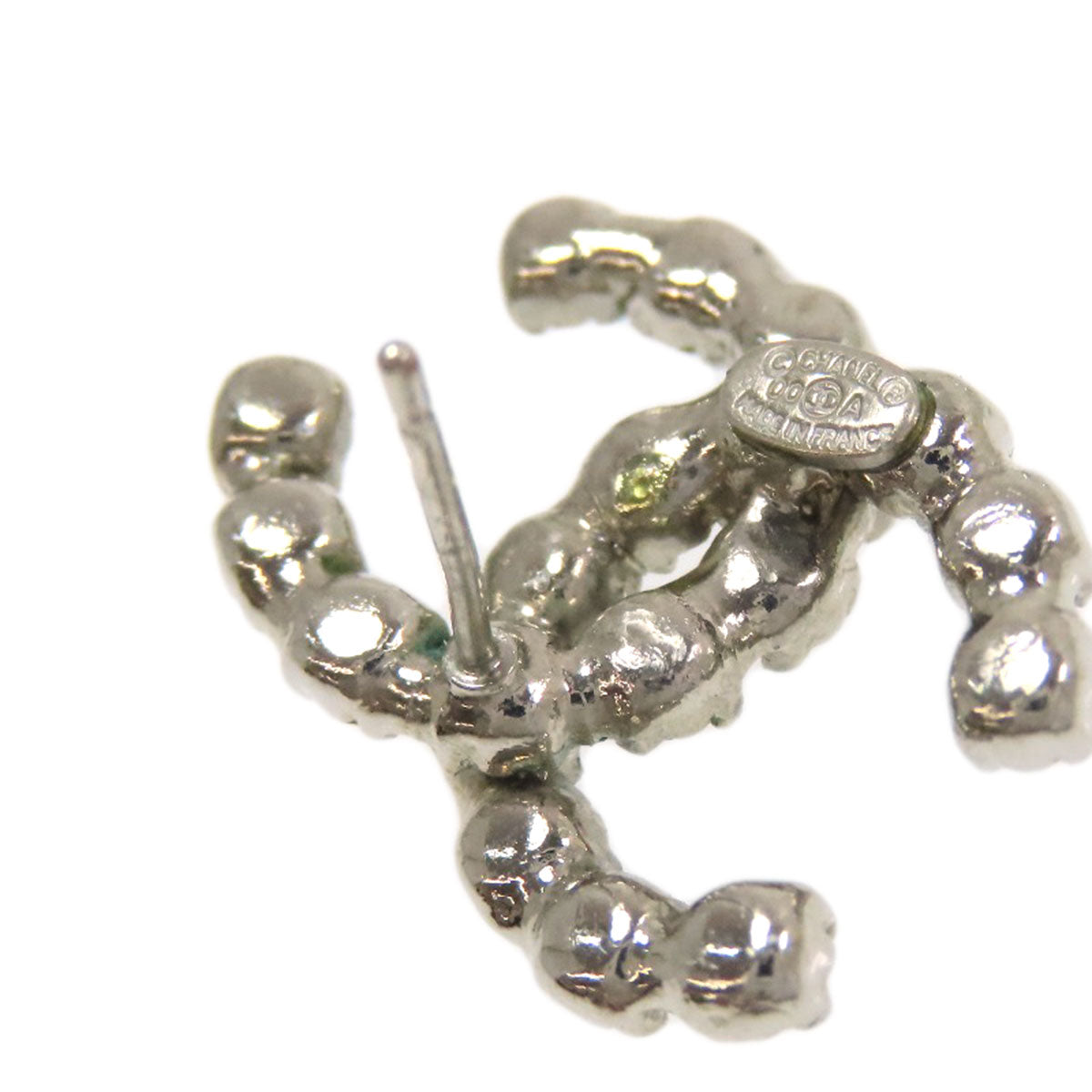 Pre-owned Chanel earrings in silver featuring unique textured design for classic elegance