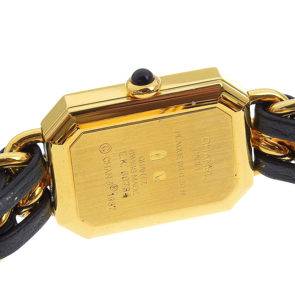 Chanel Premiere Rock Quartz for sale featuring a gold-tone case and black leather strap