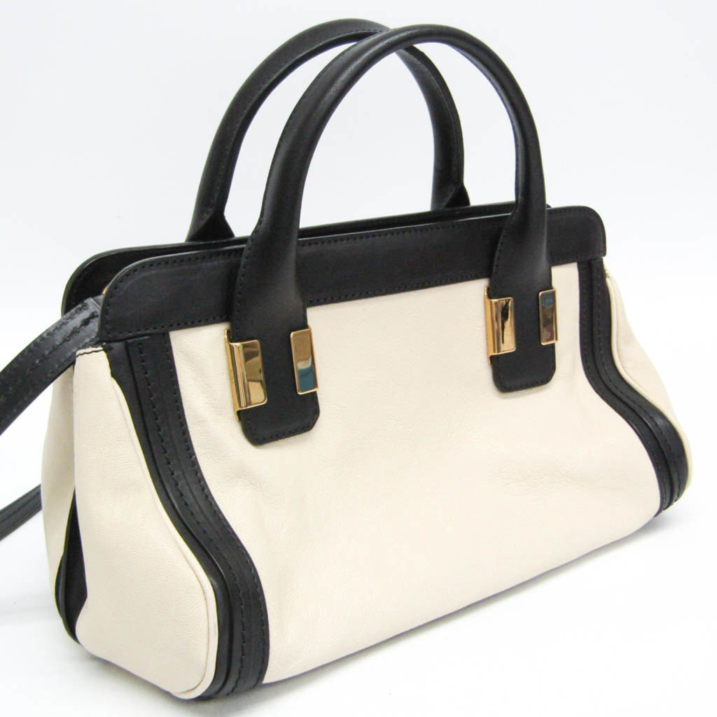 CHLOÉ Pre-Loved Little Alice Handbag in Cream and Black Leather with Elegant Design