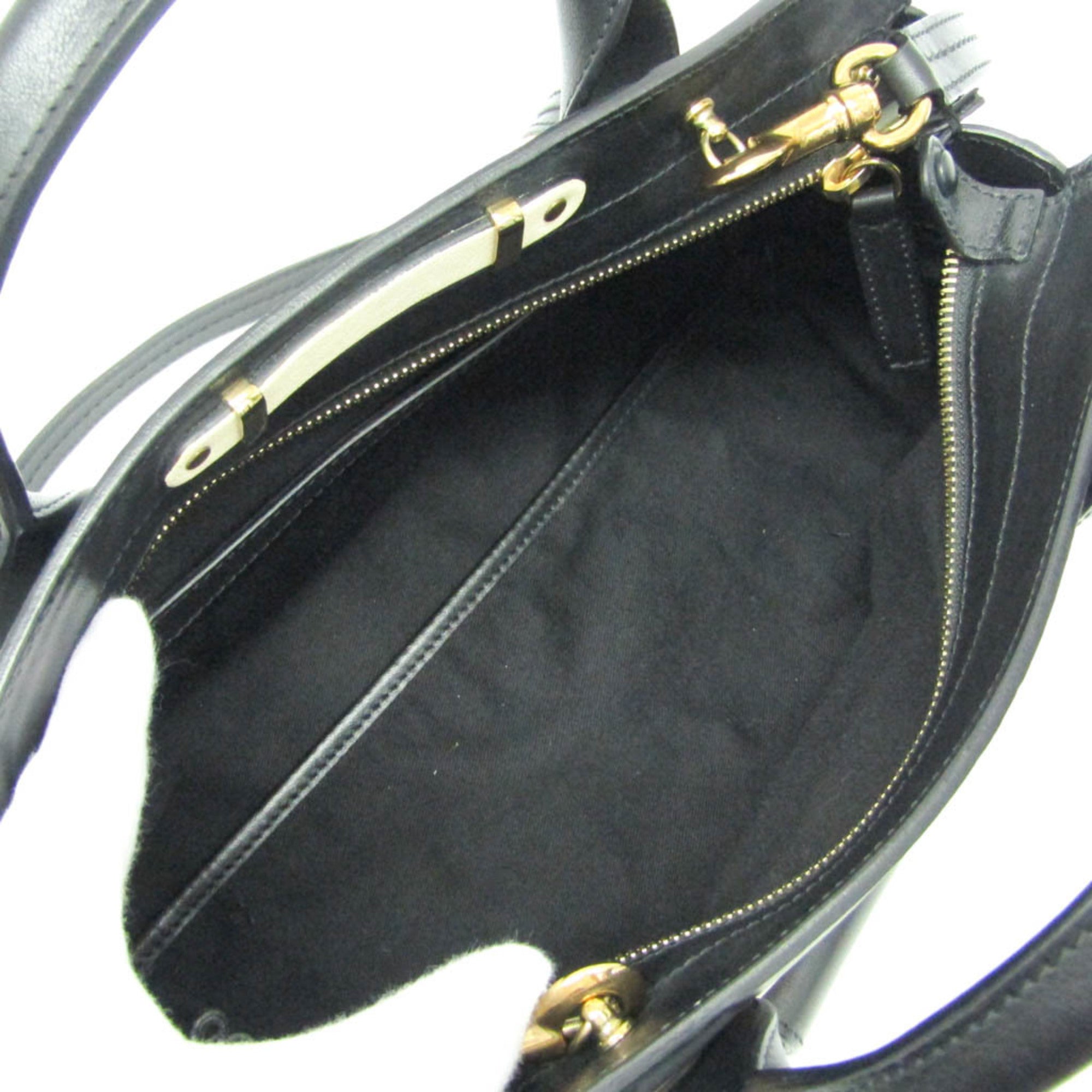 Interior view of CHLOÉ Pre-Loved Little Alice bag showcasing spacious black lining and zipper pocket