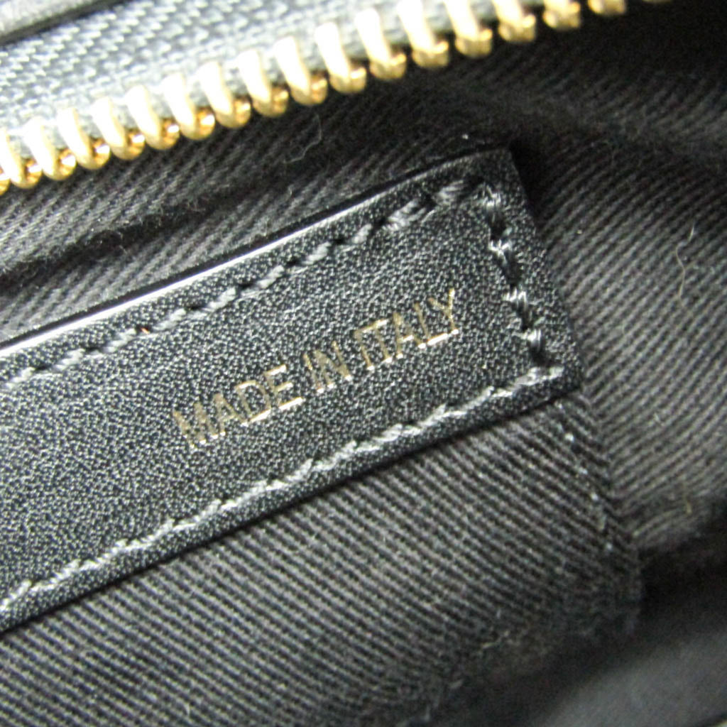 Close-up of the interior label of a CHLOÉ Pre-Loved Little Alice bag, featuring 'MADE IN ITALY' text