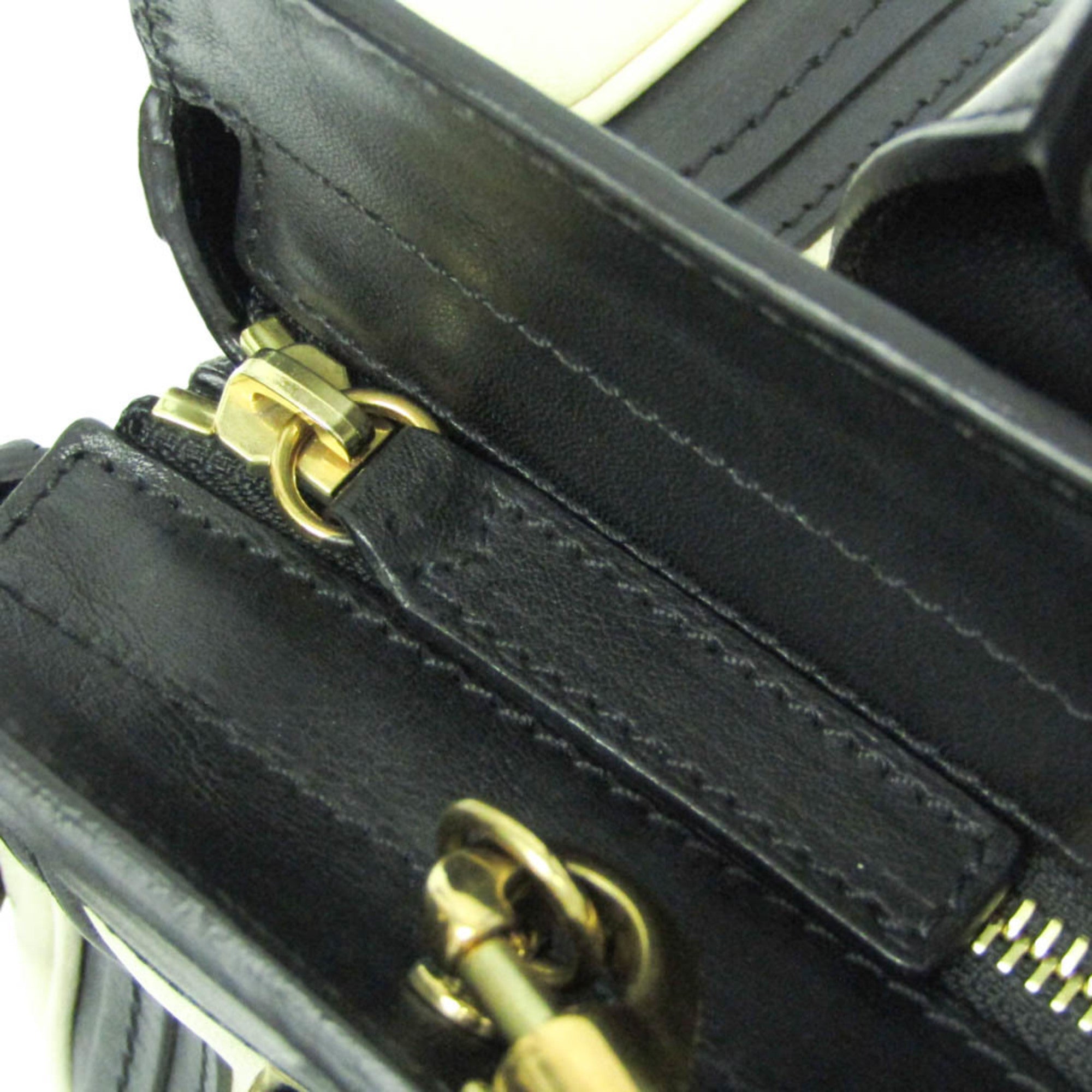 CHLOÉ Pre-Loved Little Alice bag showcasing black leather with gold hardware details