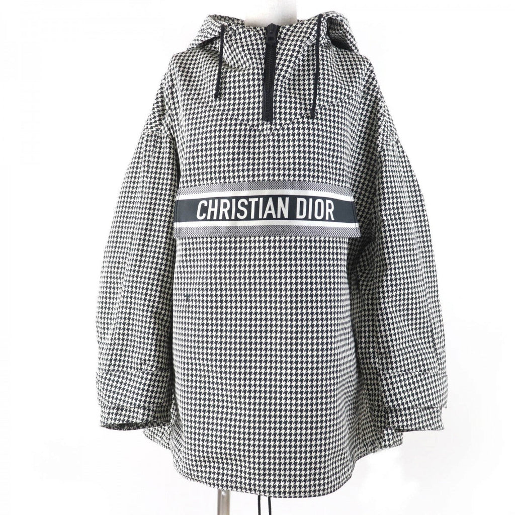 Christian Dior pre-loved anorak in houndstooth pattern with a bold logo for stylish layering