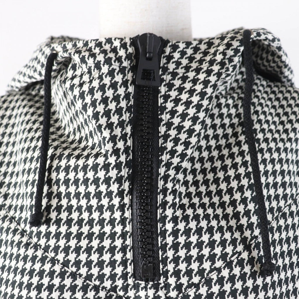 Christian Dior pre-loved anorak featuring a stylish houndstooth pattern and adjustable hood