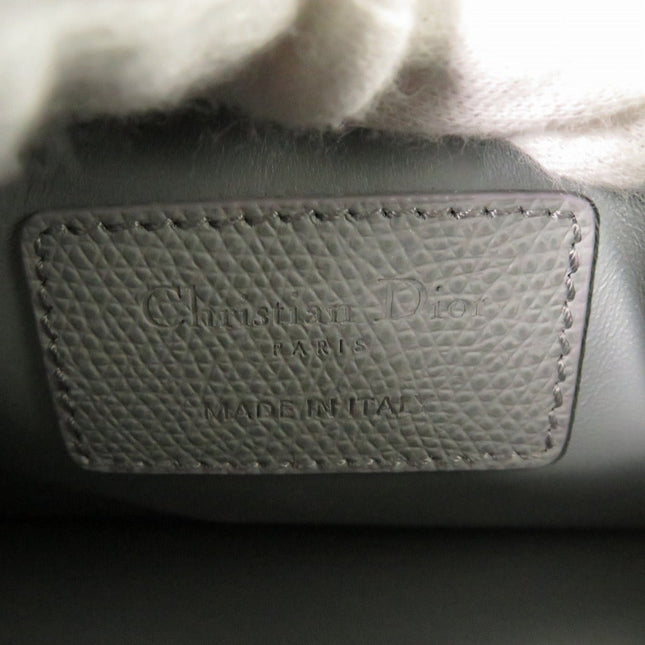 Christian Dior bag label in Like New condition showcasing premium craftsmanship and luxury details
