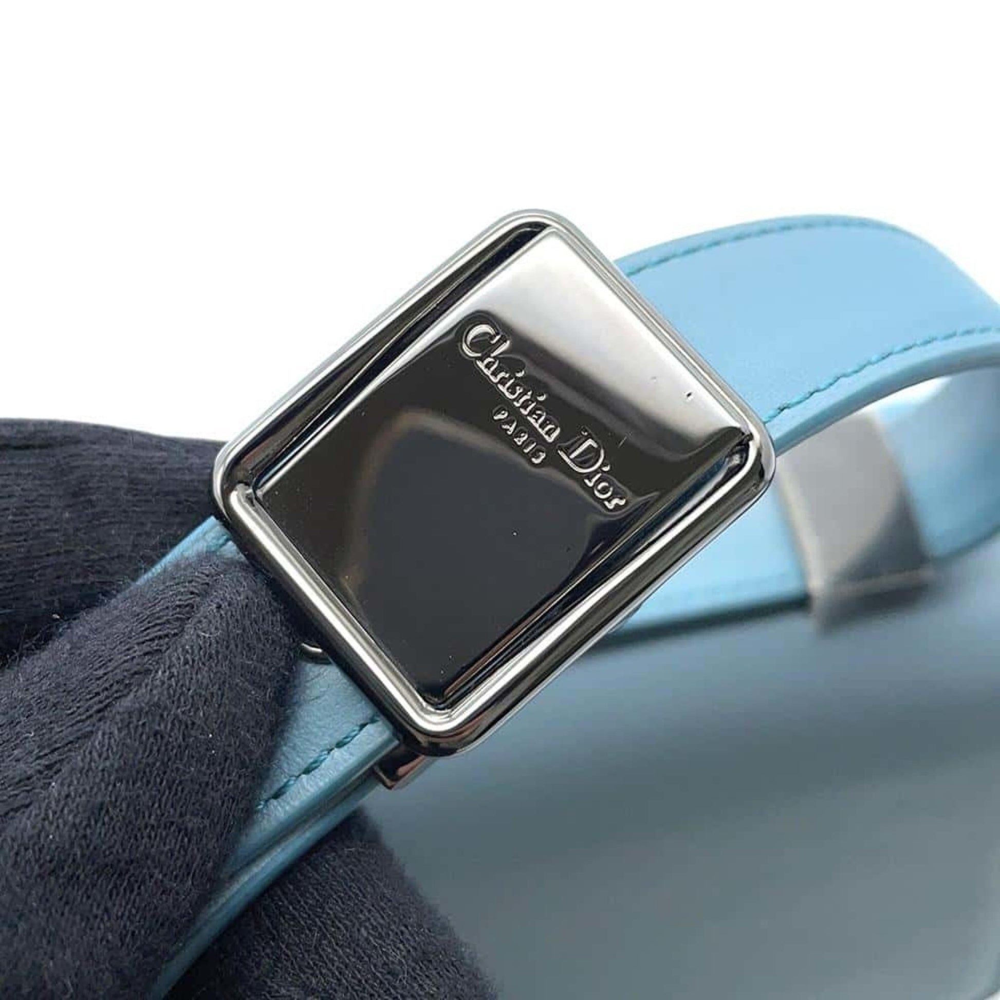 Christian Dior Pre-owned bag featuring a silver logo plaque on a blue strap