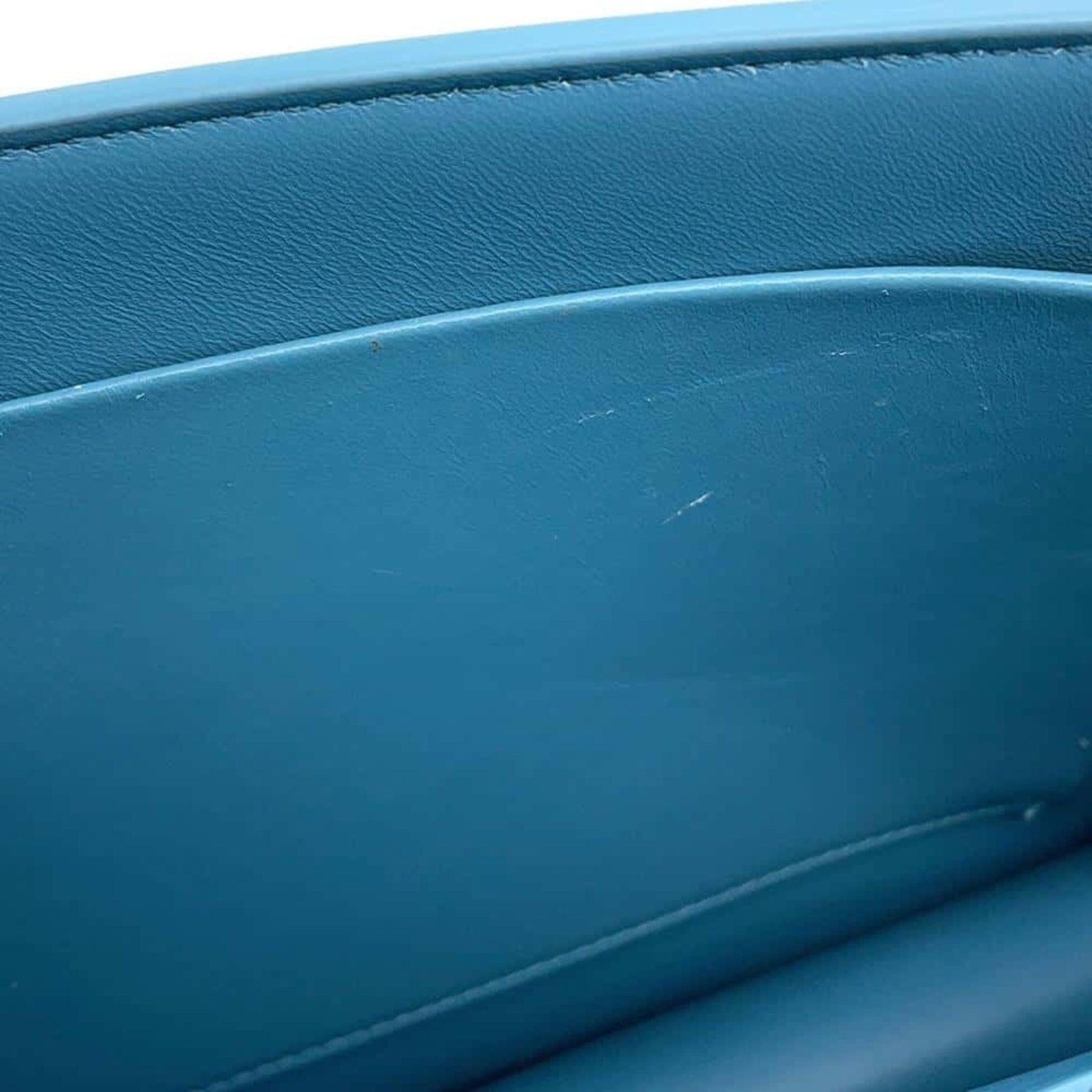 Pre-owned Christian Dior handbag featuring a sleek blue leather interior and minimalist design