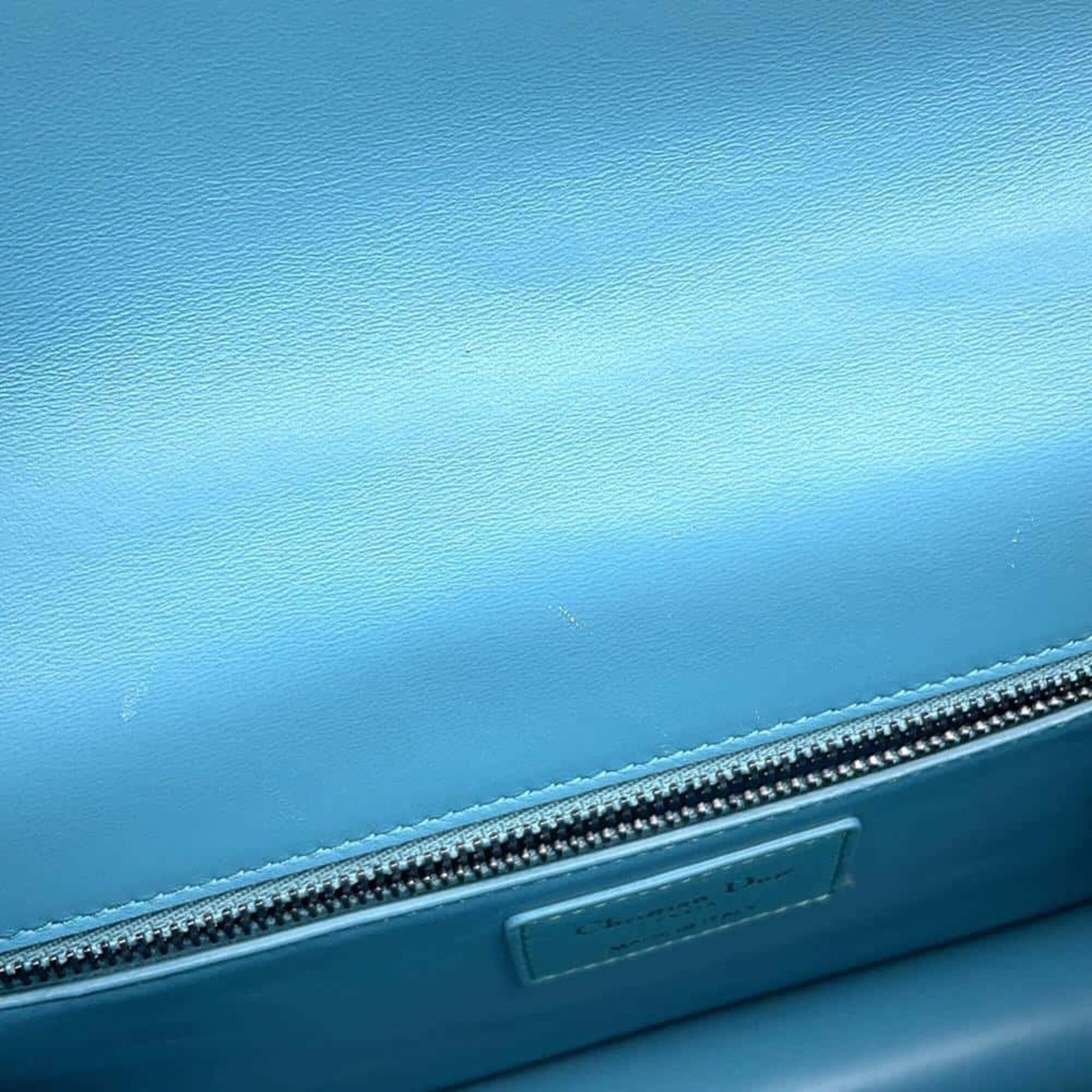 Christian Dior pre-owned blue leather bag with a zip closure and elegant design