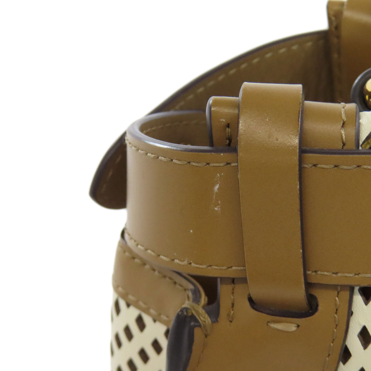 FENDI Second hand bag featuring a unique perforated design and stylish tan strap