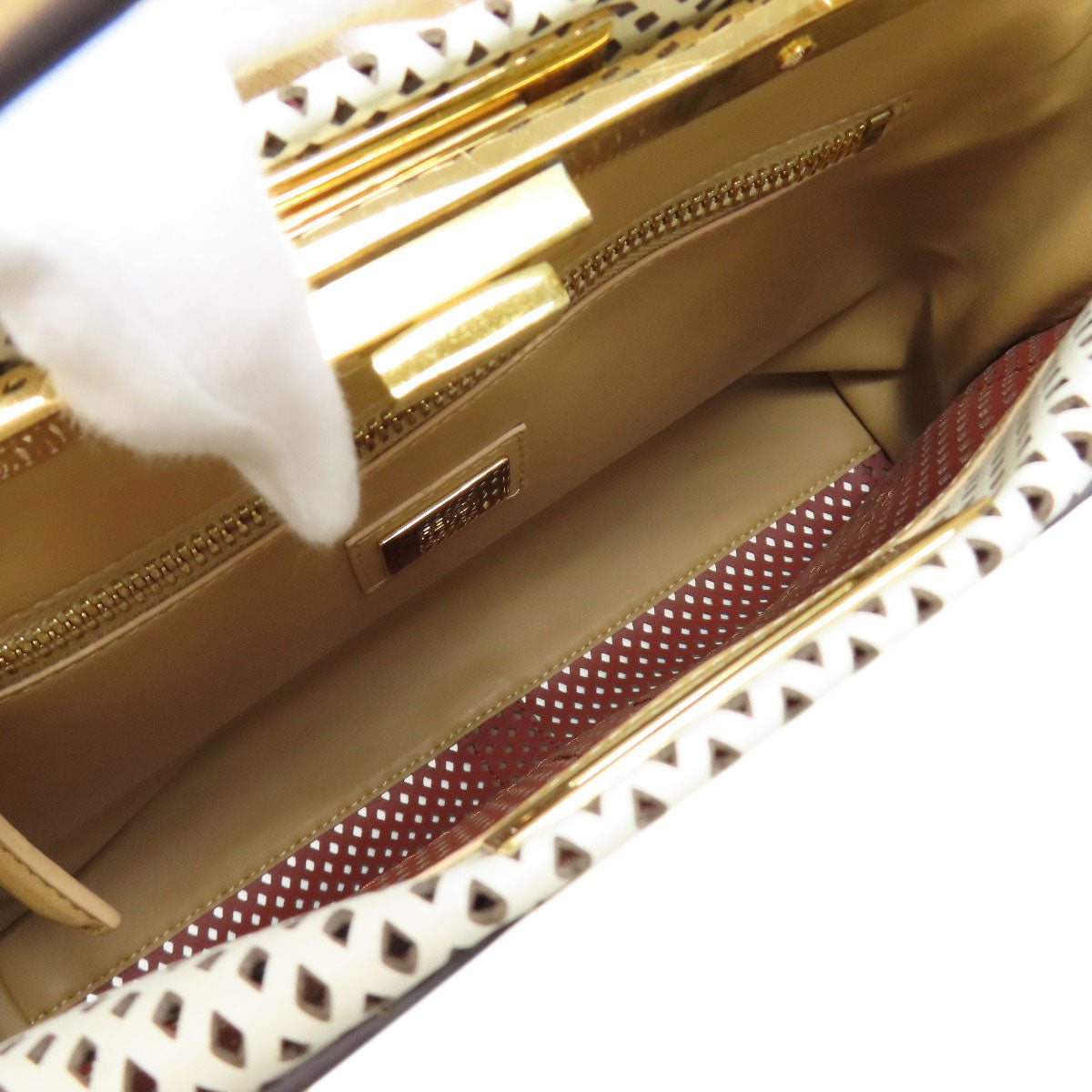 FENDI second hand bag with a spacious interior featuring gold accents and a stylish design