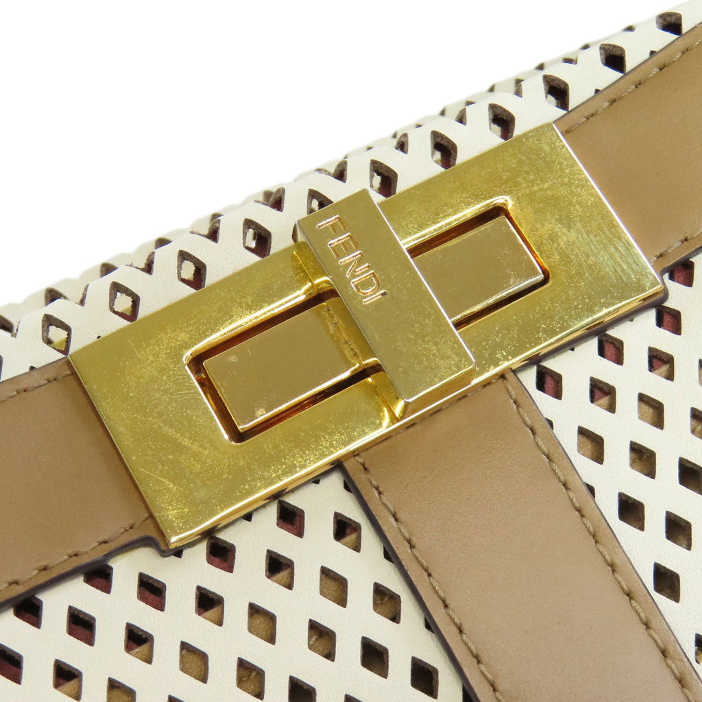 Fendi perforated bag with gold clasp, a stylish option for second hand luxury fashion