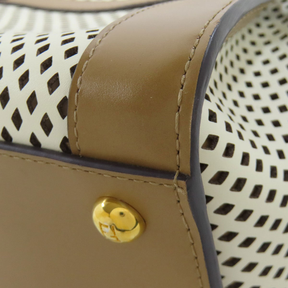 FENDI Second hand bag featuring a stylish perforated design with elegant detail