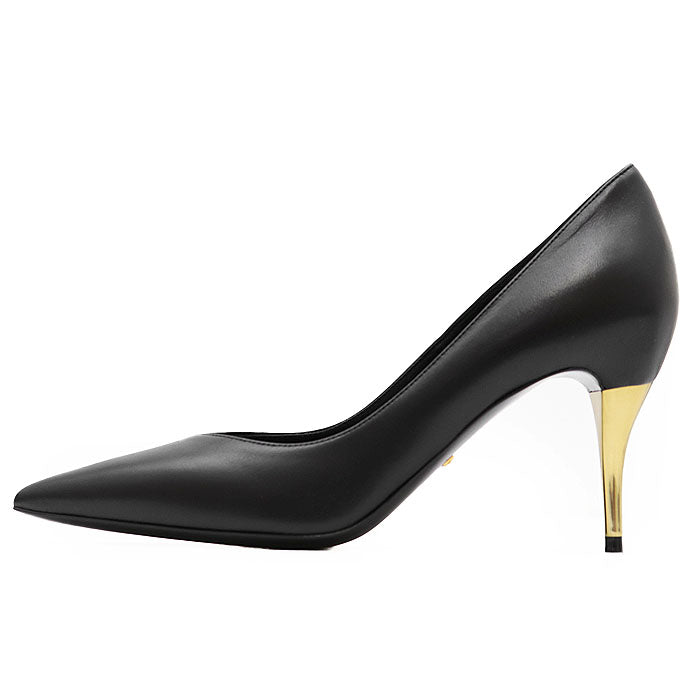 Elegant black Gucci Nero pumps with gold heel, perfect for any occasion. Buy used Gucci Nero pumps online.