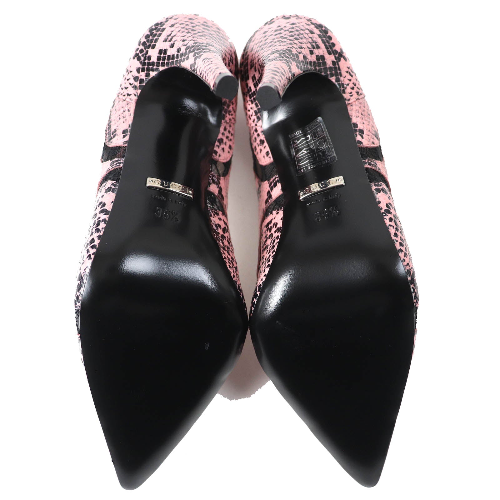 Gucci pink leather pumps featuring a stylish leopard print design with a pointed toe