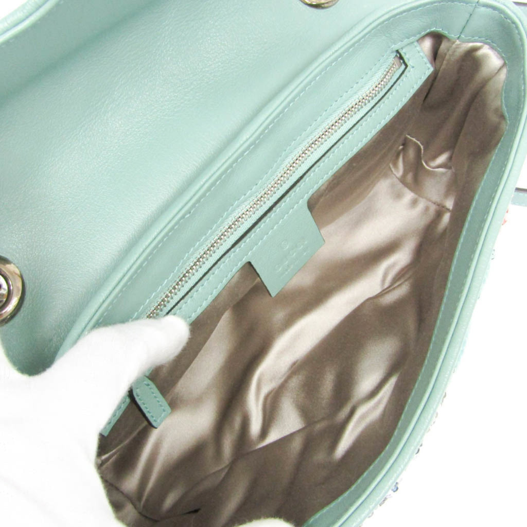 Interior view of GUCCI Pre-Loved GG Marmont shoulder bag featuring a spacious compartment with a soft lining