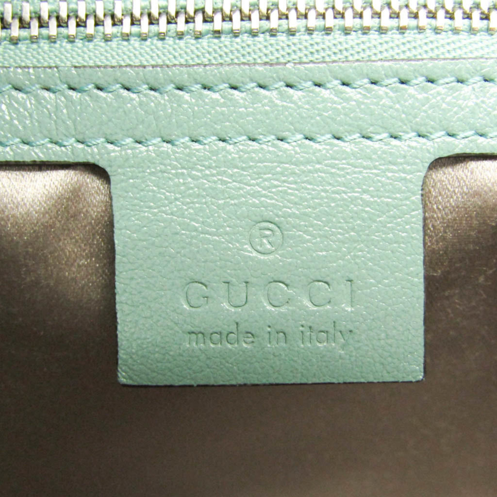 GUCCI Pre-Loved GG Marmont shoulder bag interior tag with logo and made in Italy detail