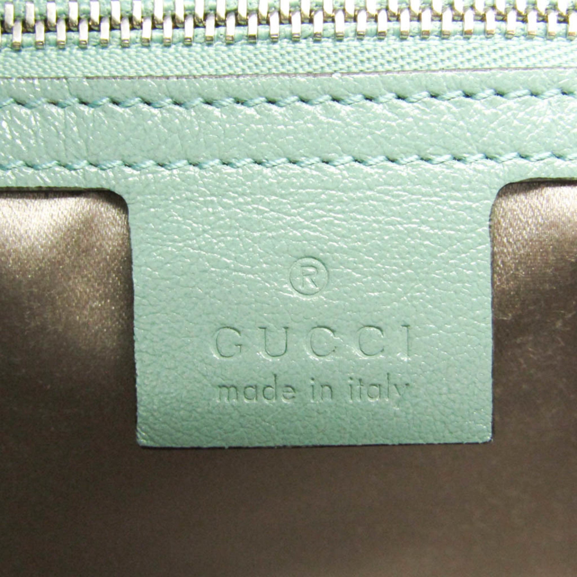 GUCCI Pre-Loved GG Marmont shoulder bag interior tag with logo and made in Italy detail