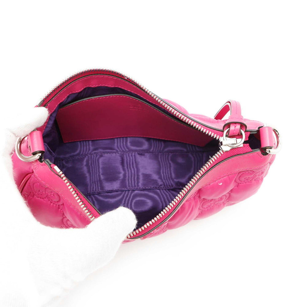 Interior view of MANSII GUCCI Pre-Loved GG Matelasse shoulder bag showing vibrant lining and spacious compartment