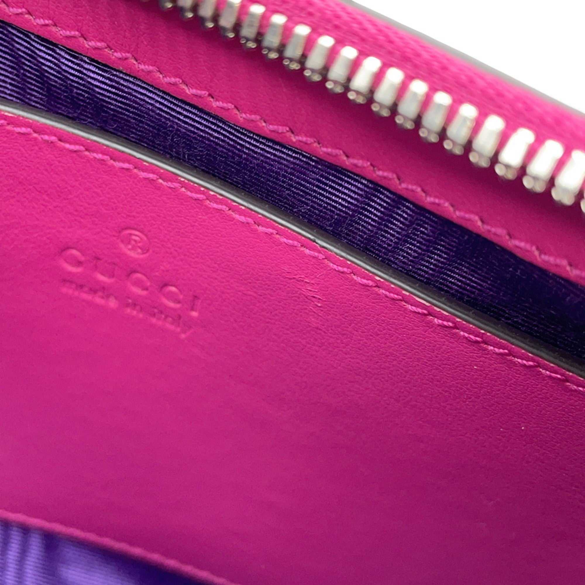 Interior view of GUCCI Pre-Loved GG Matelasse shoulder bag featuring vibrant lining and zipper detail