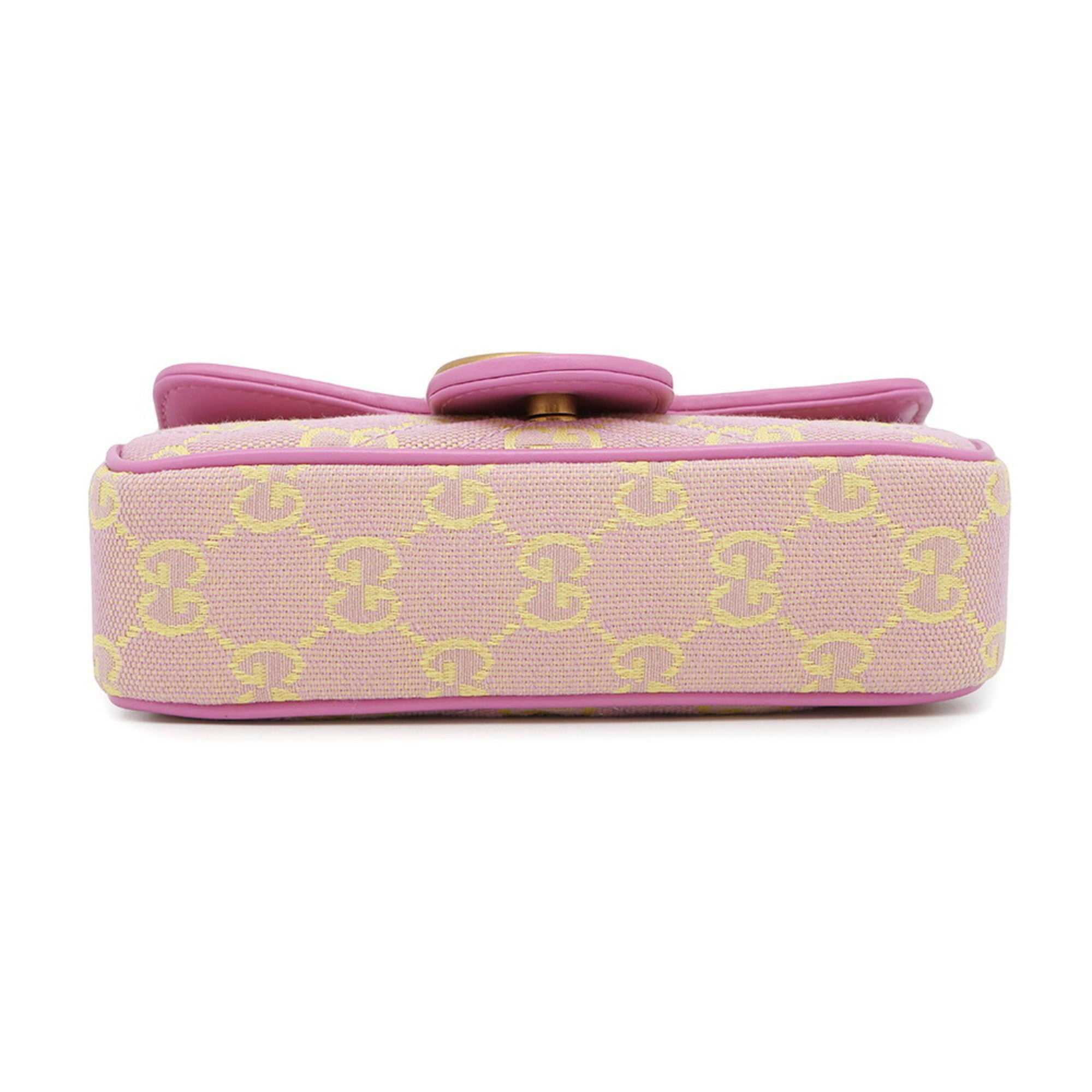 MANSII GUCCI Pre-Loved GG Super Mini Canvas bag in pink with yellow logo pattern and elegant design