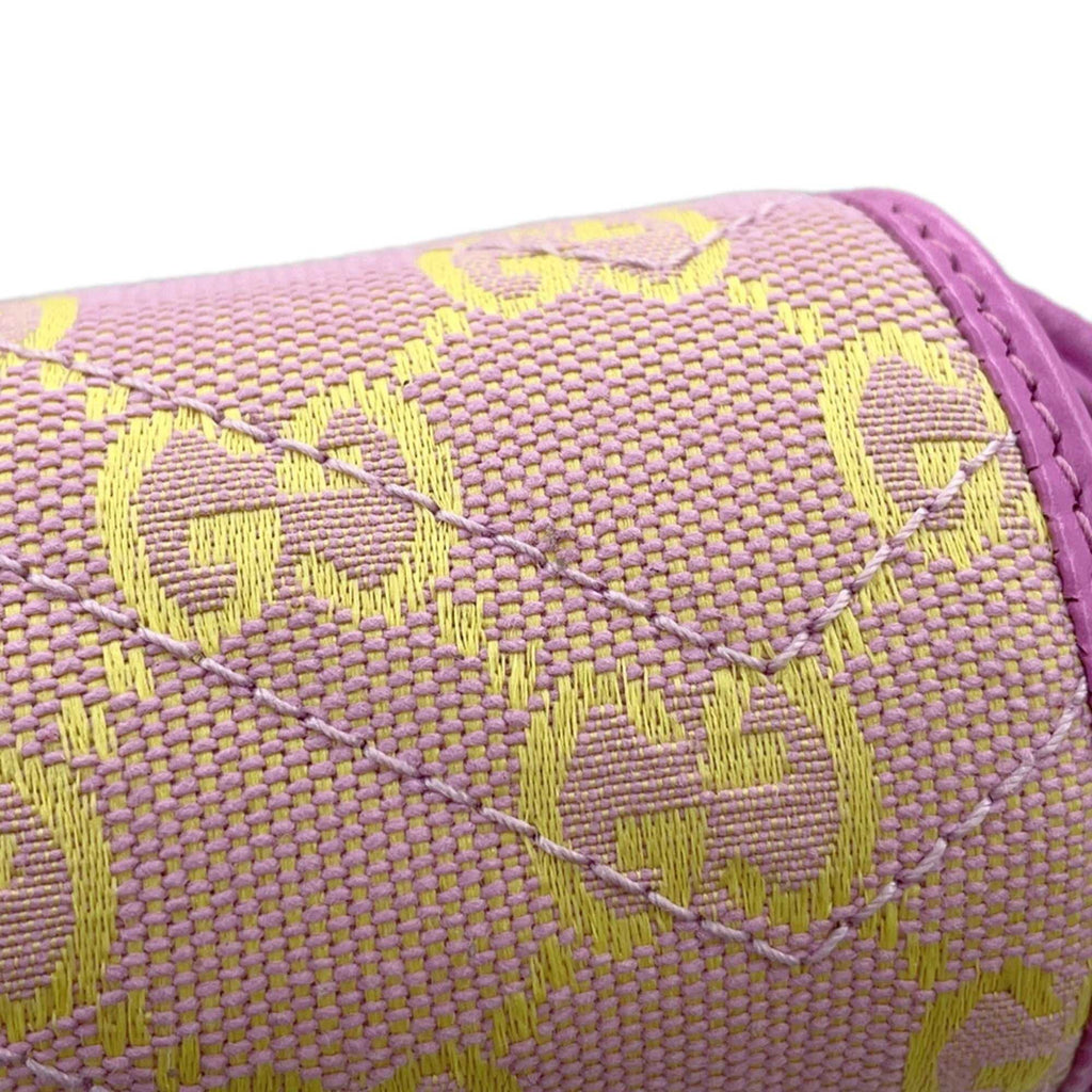 MANSII GUCCI Pre-Loved GG Super Mini Canvas bag in pink and yellow with iconic GG pattern