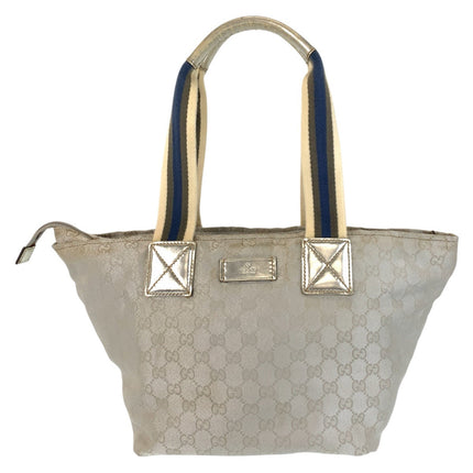 GUCCI pre-owned tote bag in beige with signature logo and dual-colored straps