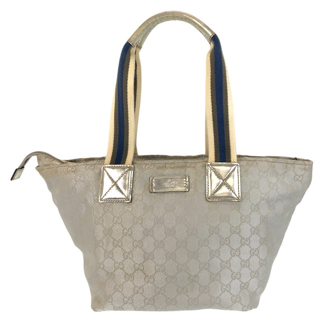 GUCCI pre-owned tote bag in beige with signature logo and dual-colored straps