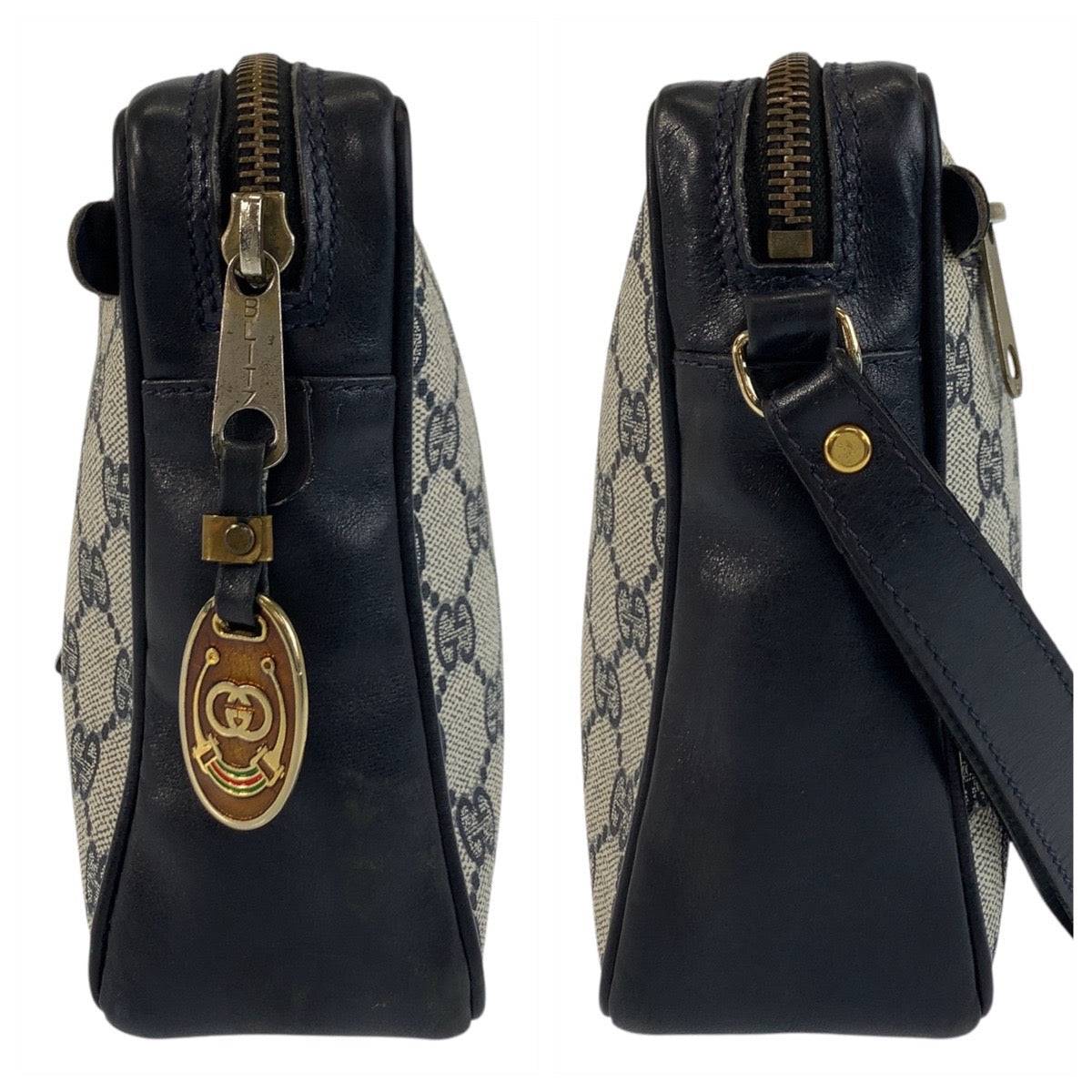 GUCCI pre-owned canvas and leather bag with a zipper closure and gold-tone hardware