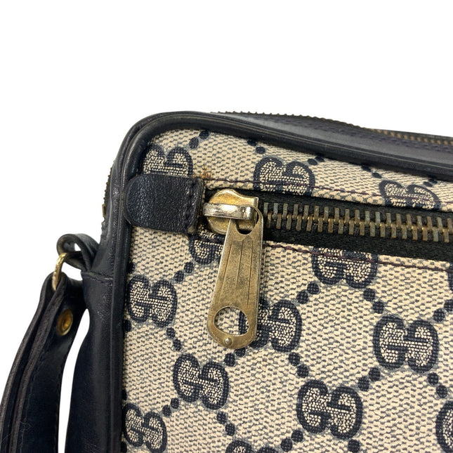 GUCCI pre-owned bag featuring a classic monogram design and sleek leather accents