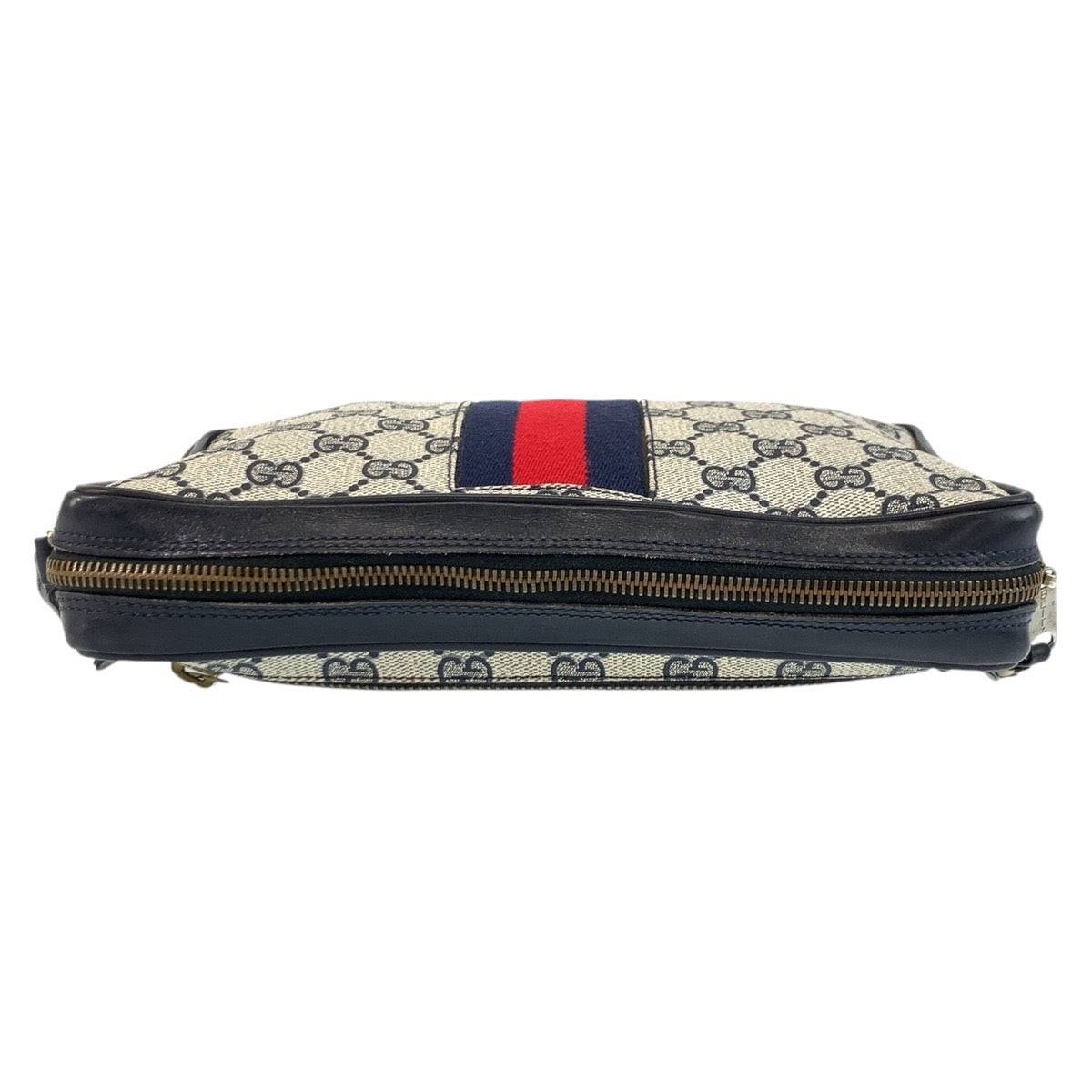 GUCCI pre-owned bag featuring a classic design with iconic logo and contrasting stripes