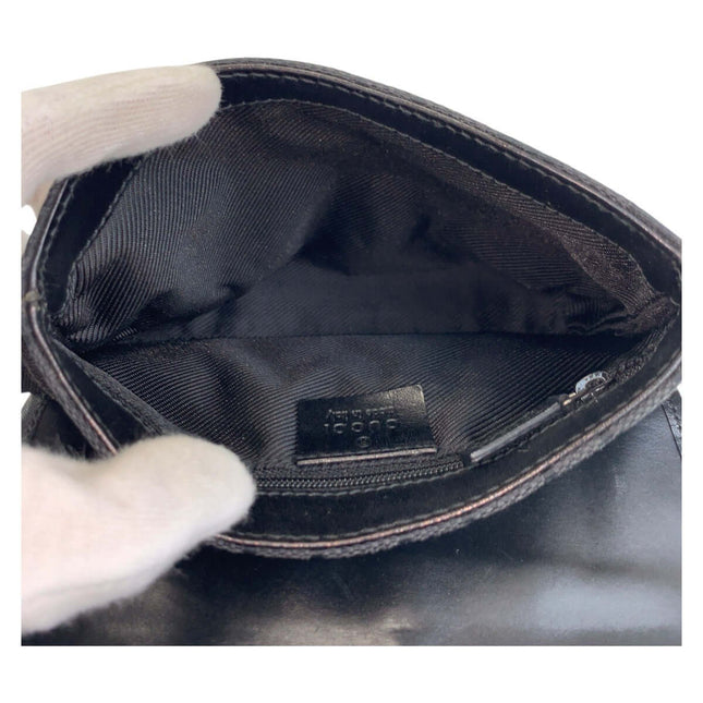 Interior view of a GUCCI pre-owned bag showcasing the label and quality lining