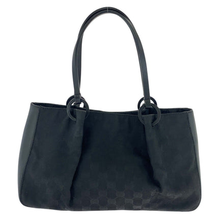 GUCCI pre-owned black canvas tote bag with two circular handles for stylish everyday use.