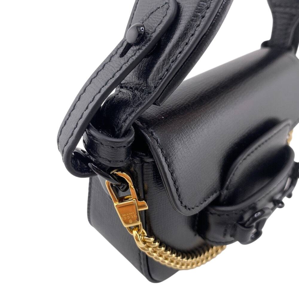 GUCCI pre-owned black leather shoulder bag with gold chain detail and adjustable strap