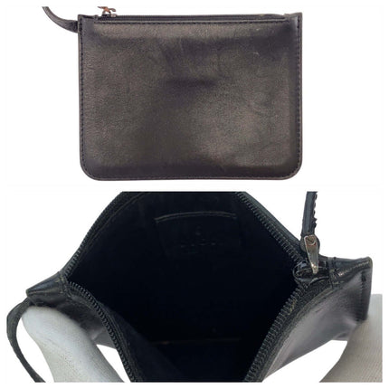 GUCCI black leather bag, pre-owned, featuring a sleek design with zip closure and spacious interior