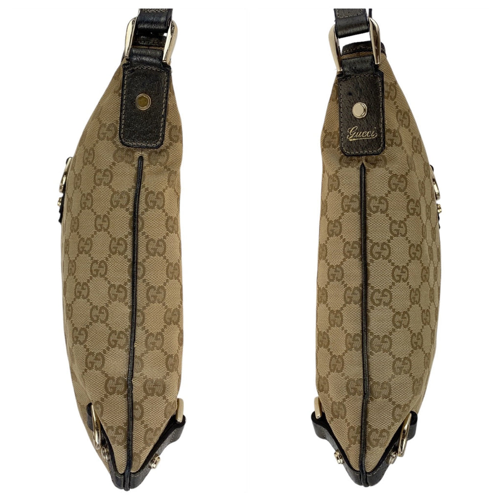 GUCCI vintage shoulder bag in signature canvas with leather accents and adjustable strap