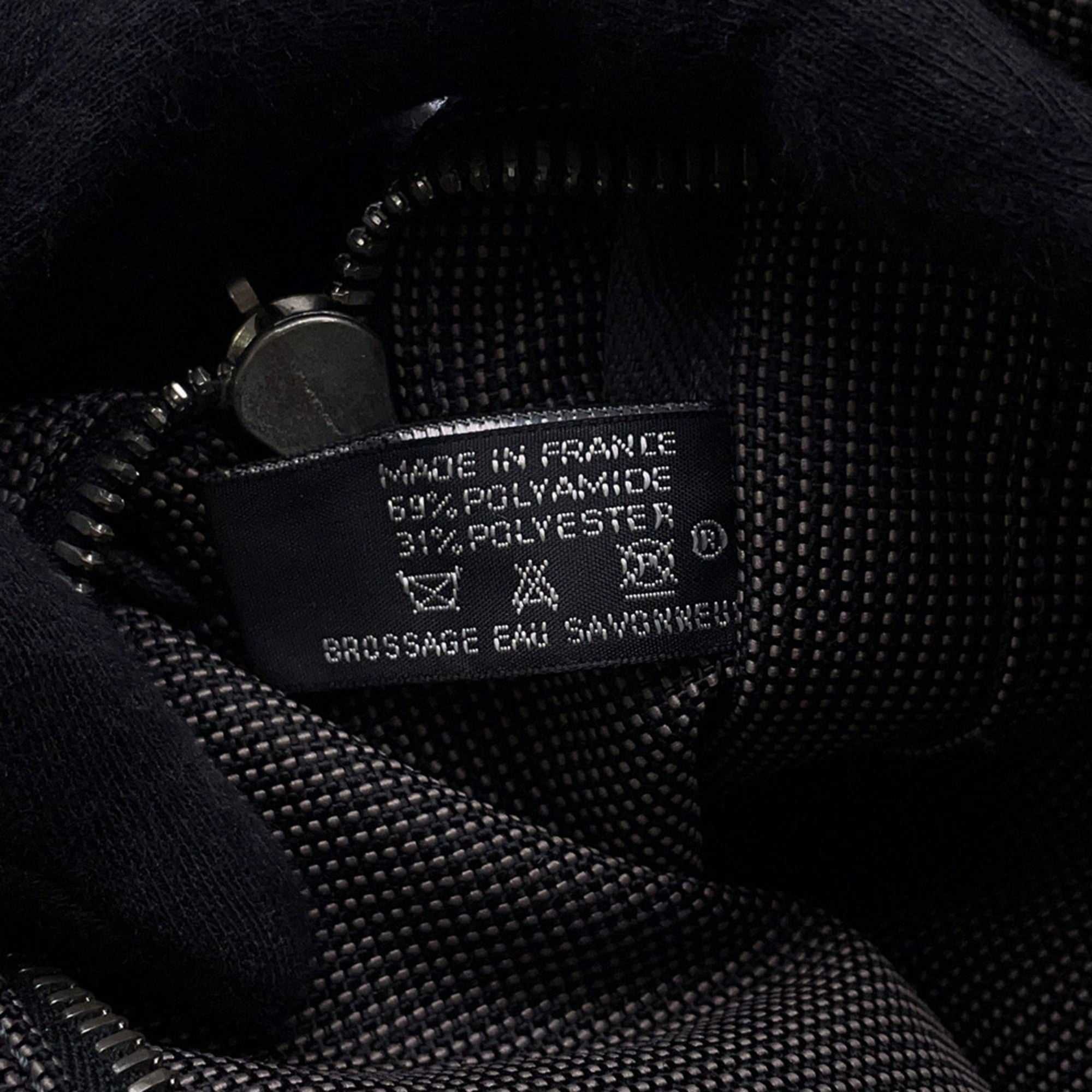 Interior of Hermès Pre-Loved Air Line PM Tote Bag with fabric label and zipper detail