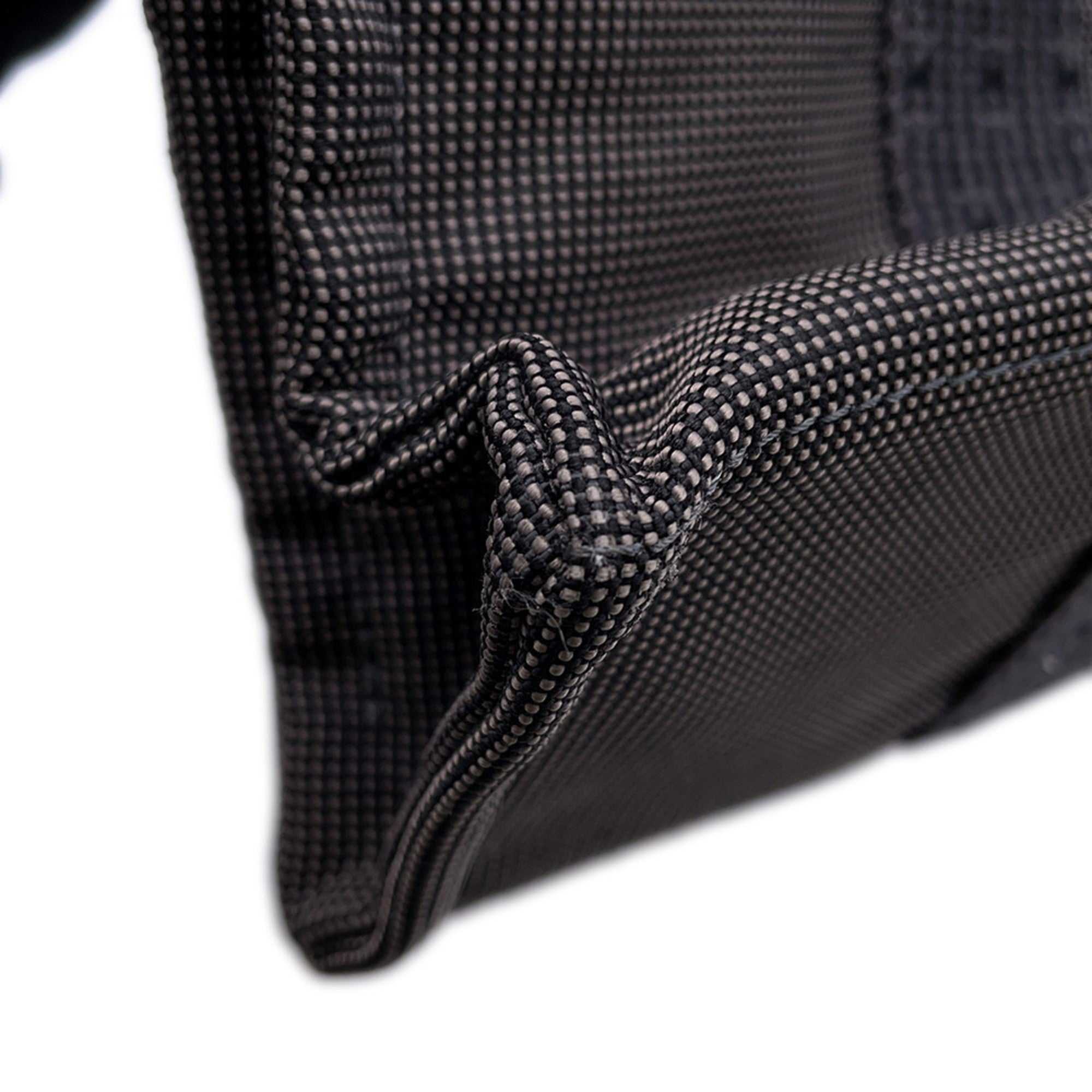 Close-up of MANSII Hermès Pre-Loved Air Line PM Tote Bag showing detailed stitching and fabric texture